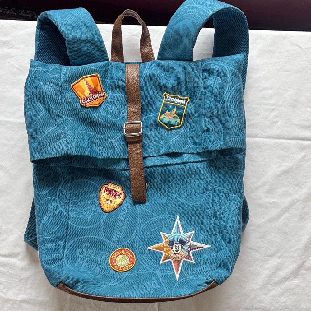 Blue and Brown Backpack with Patches